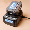 Versamax 20v Rechargeable Li Ion Battery On Charger.jpg