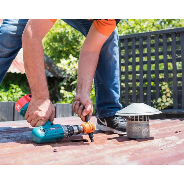 Professional Nibbler Installing Chimney Flue